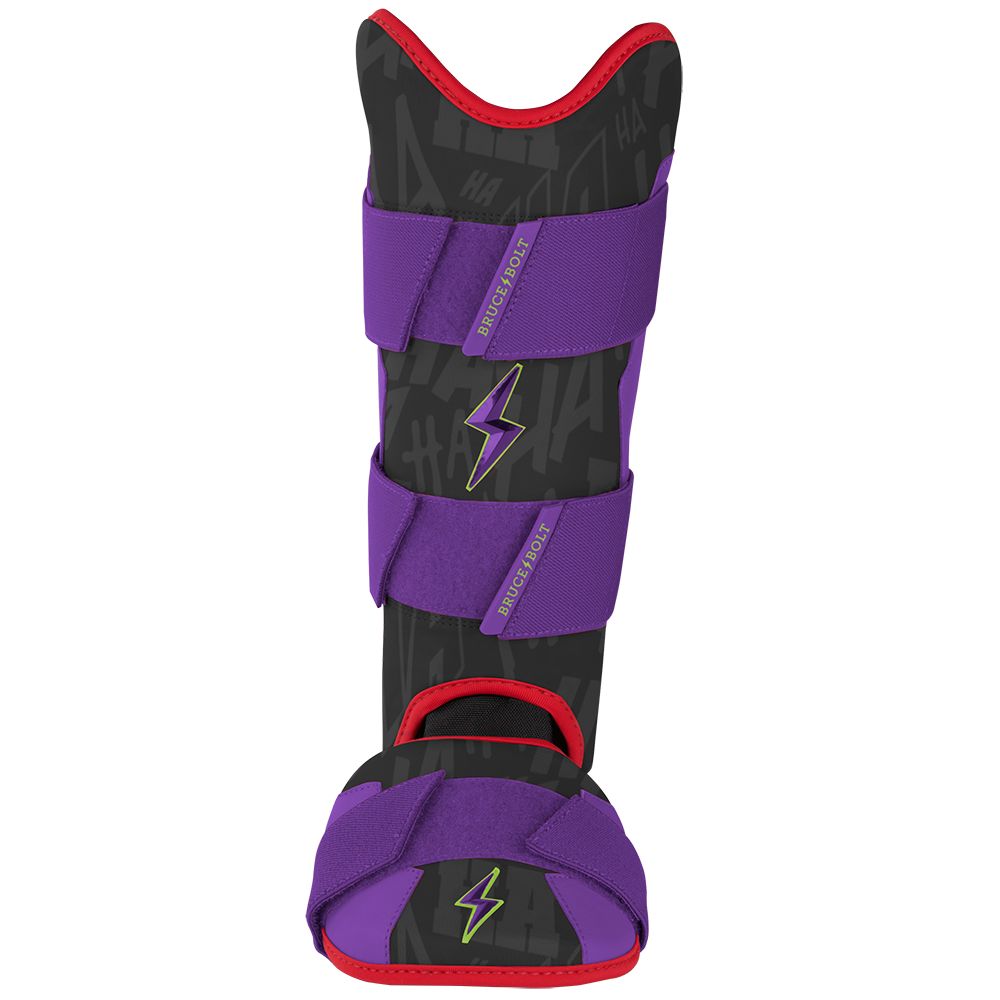 Bruce Bolt black, purple, and red baseball leg and ankle guard with a lightning bolt graphic.