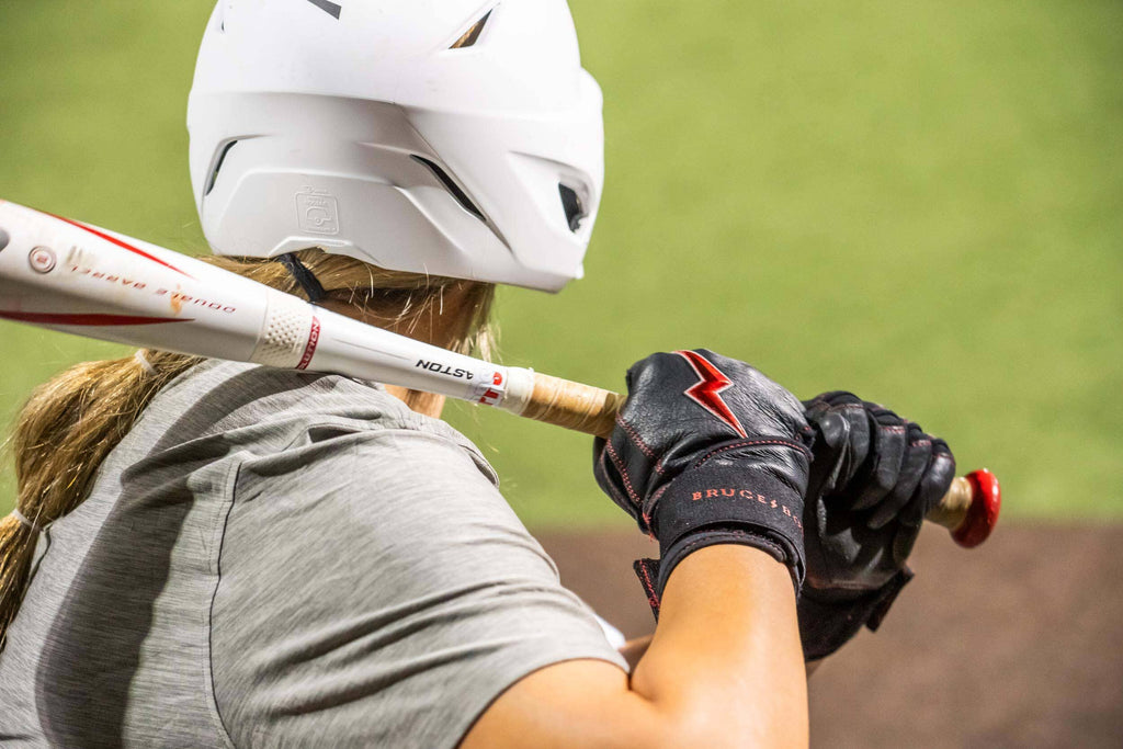 Softball player holding a bat