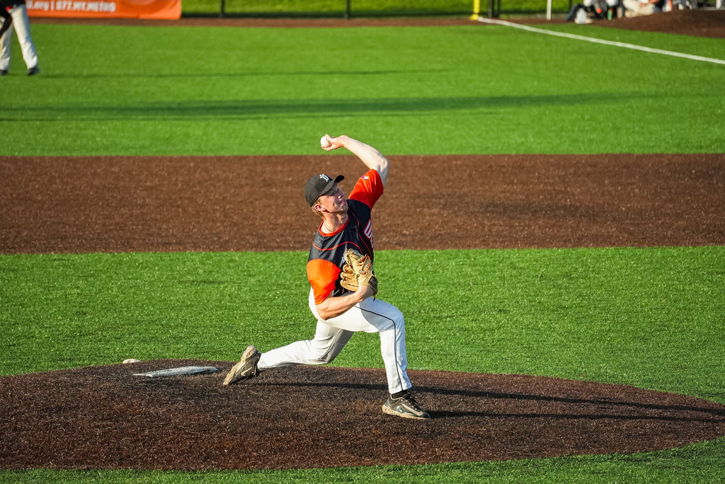 Image of a pitcher delivering a pitch