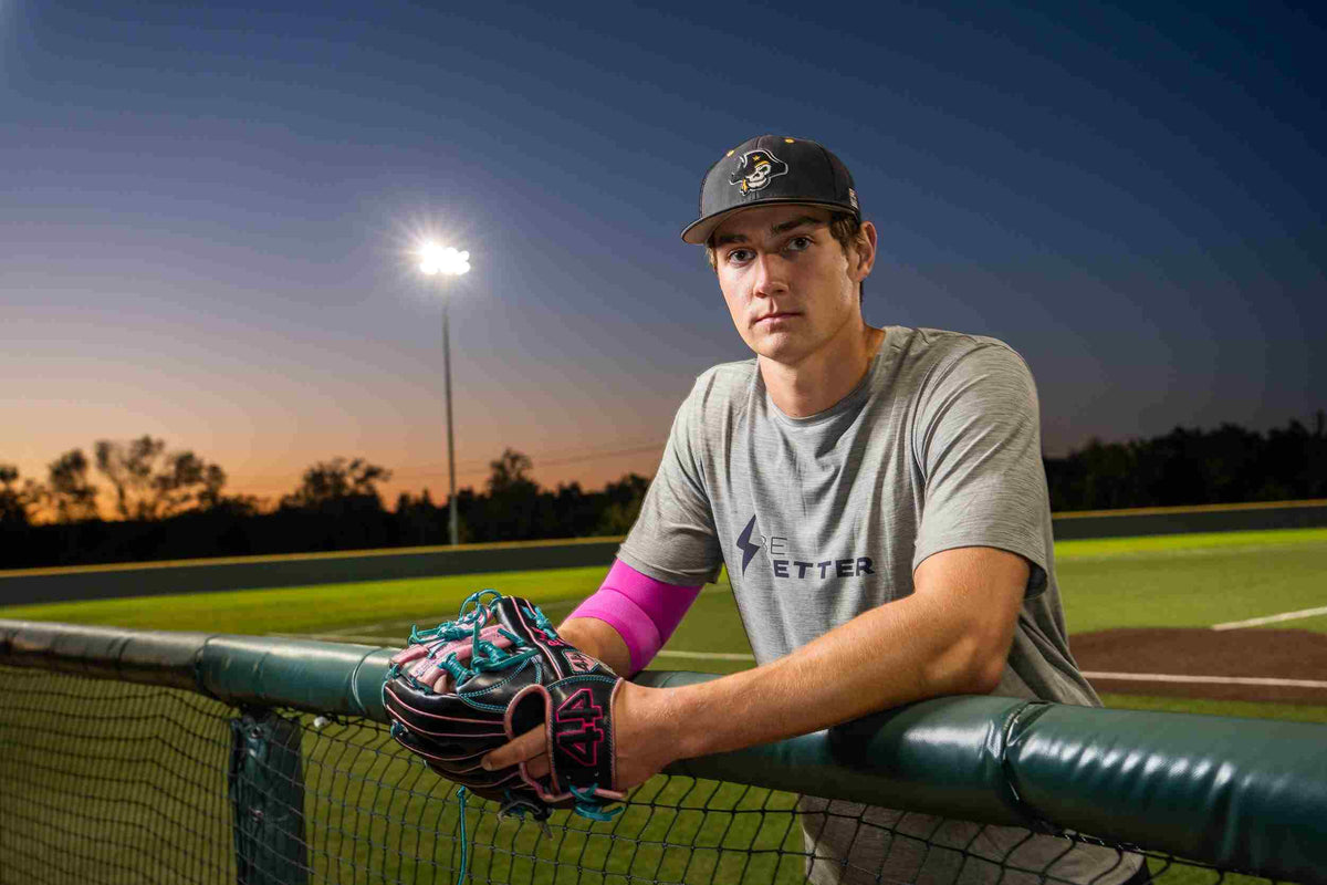 Image of baseball player with compression sleeve.