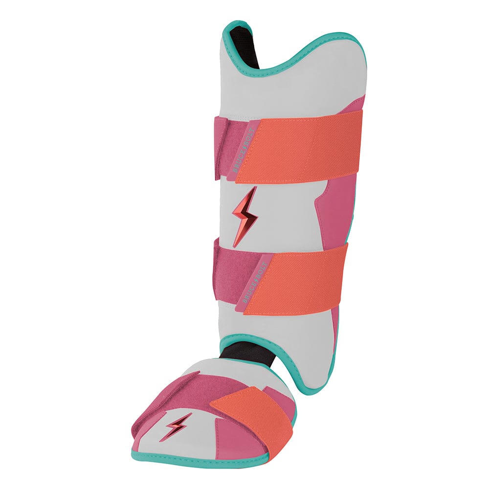 White, pink, and teal leg and ankle guard with orange straps and metallic lightning bolt logos.