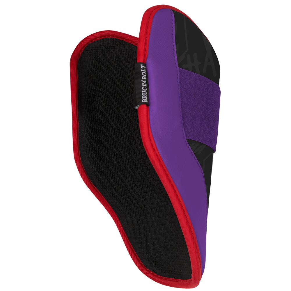 Black, purple, and red elbow guard with a Bruce Bolt logo label.