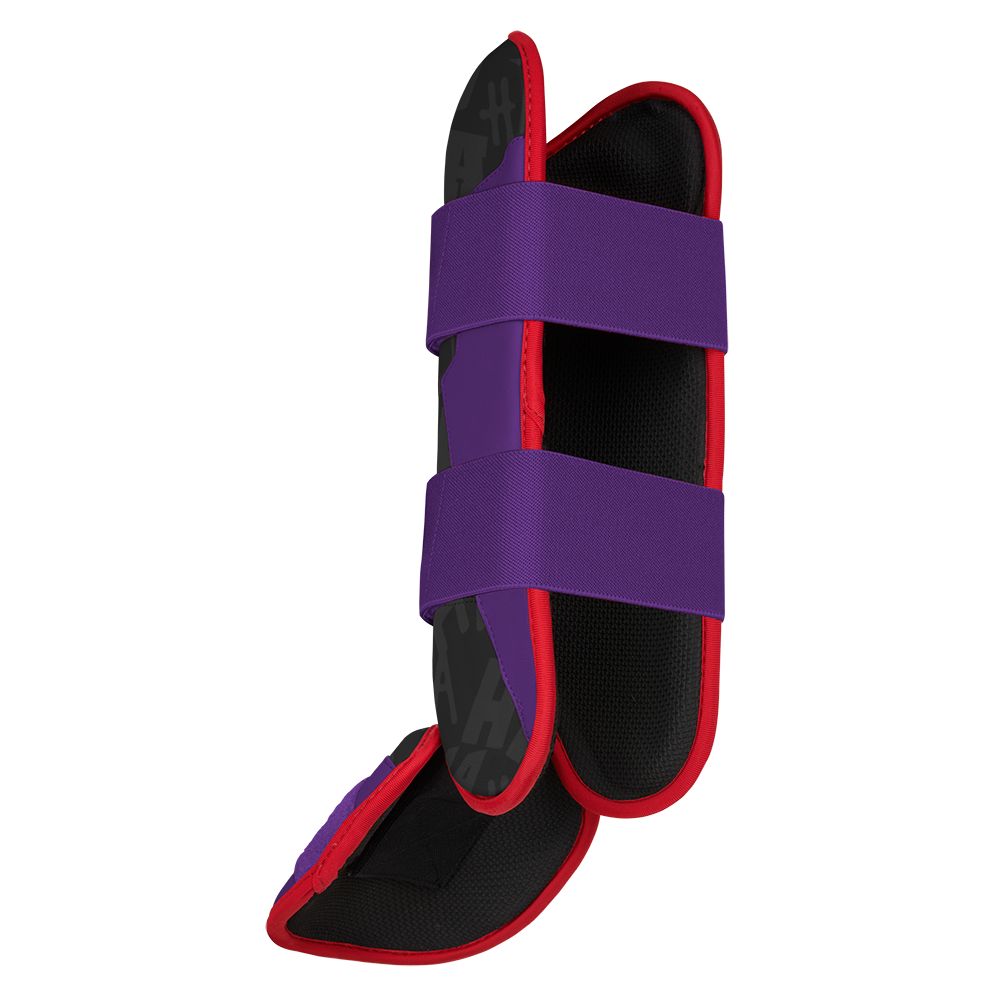 Purple, black, and red leg guard with two elastic straps and an attached ankle piece.