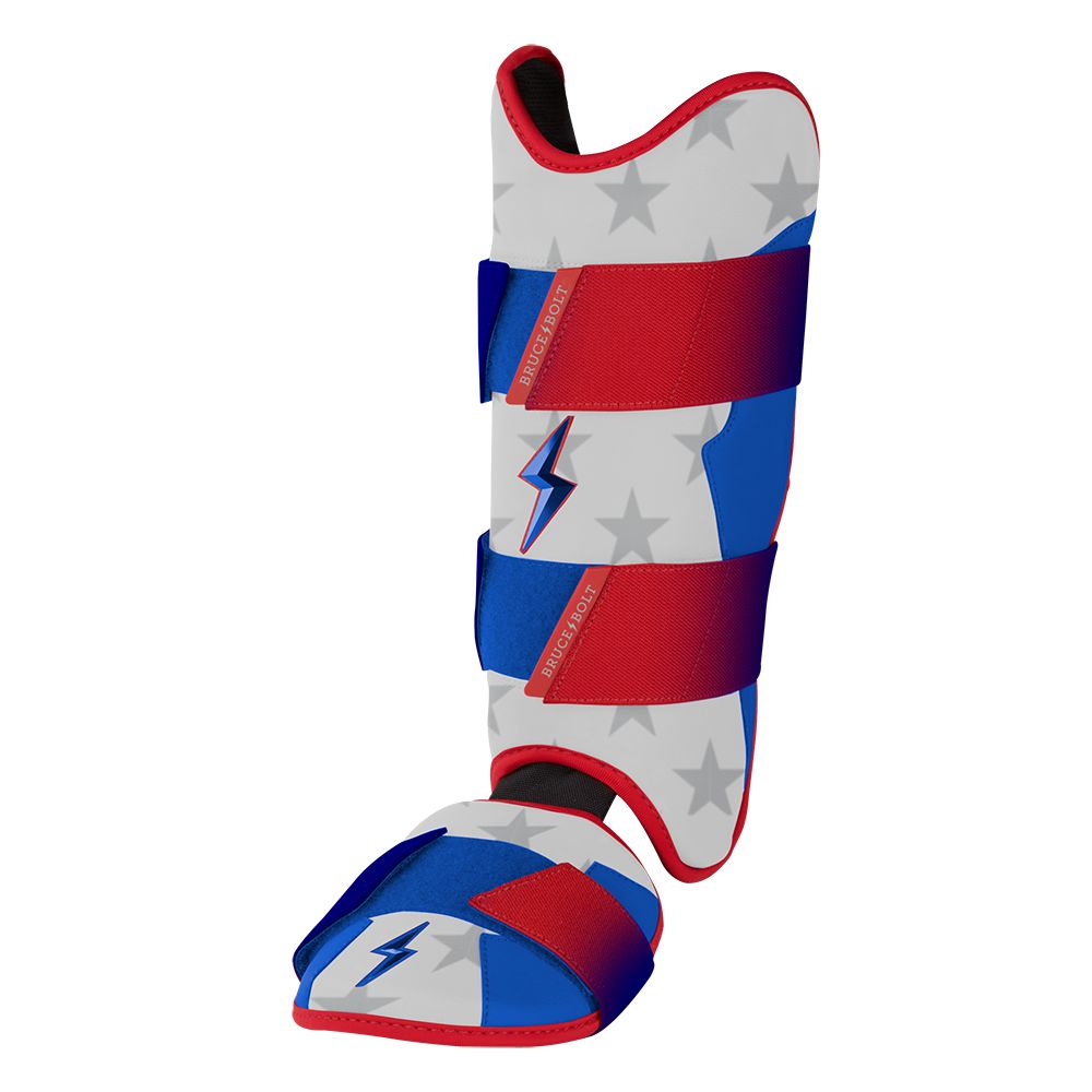 Red, white, and blue baseball leg and ankle guard with a star pattern and lightning bolt accents.