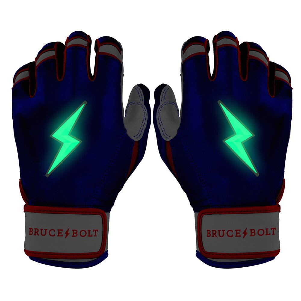 Pair of blue batting gloves featuring glowing green lightning bolt logos and grey wrist straps with red branding.