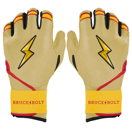 A pair of ivory long-cuff batting gloves featuring gold lightning bolt logos and yellow wristbands with red accents.