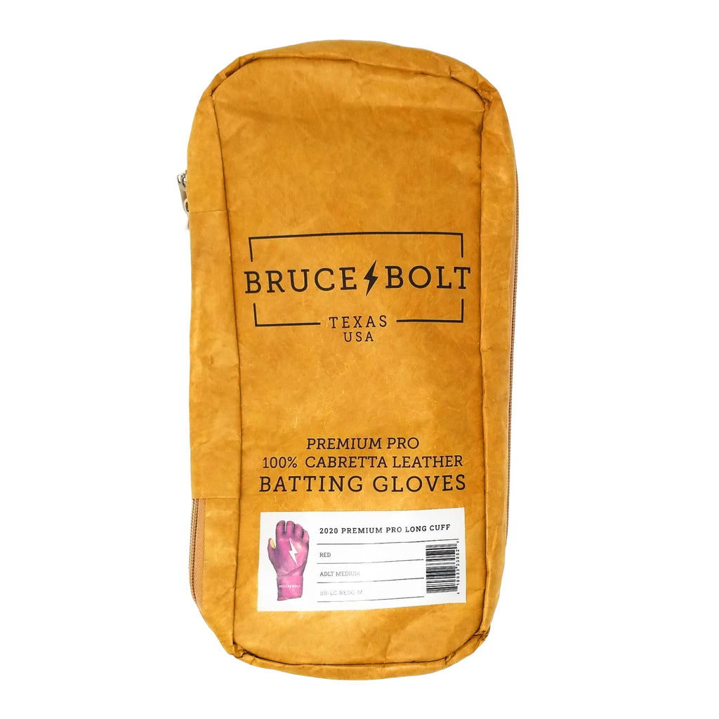 BRUCE BOLT 2021 PREMIUM PRO GLOVE BAG. This is a batting glove bag made specifically for carrying BRUCE BOLT batting gloves.  The glove is kraft or tan color with black text and a black lightning bolt.  This bag has BRUCE BOLT Stickers and a Helmet Sticker inside. 