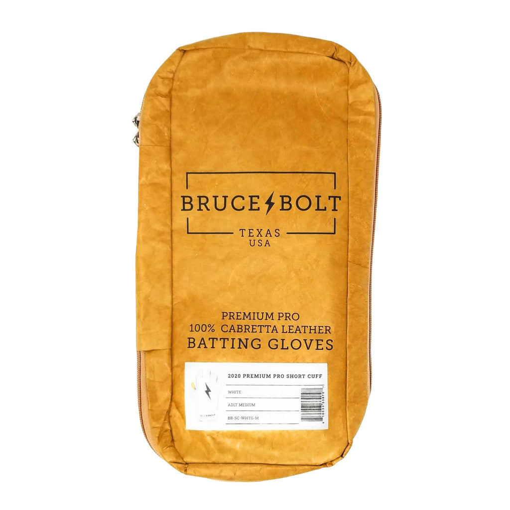 BRUCE BOLT white Short Cuff 2021 PREMIUM PRO GLOVE BAG. This is a batting glove bag made specifically for carrying BRUCE BOLT batting gloves.  The glove is kraft or tan color with black text and a black lightning bolt.  This bag has BRUCE BOLT Stickers and a Helmet Sticker inside. 